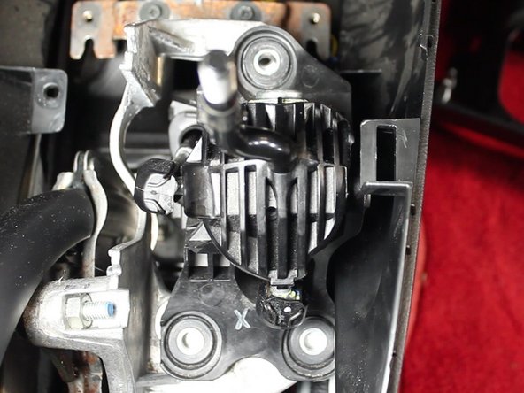 Once the shifter assembly has been fully exposed, remove the 3 mounting bolts.