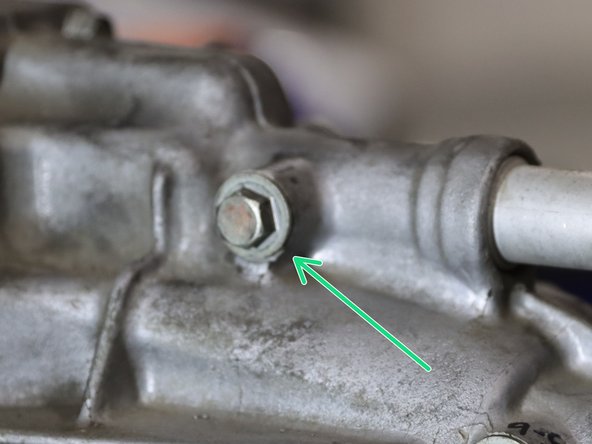 On the LH side of the transmission case, you will find the Front/Back detent spring located directly across from the L/R spring. This spring controls the stiffness when moving the shift lever forward or backward. Meaning this will increase the stiffness while shifting into ALL gears. You can install any of the remaining springs in this location.