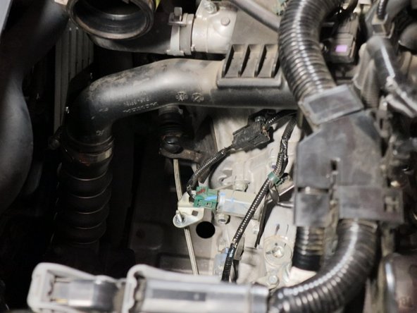 Locate the reverse solenoid on the top of the transmission and unplug the green connector.