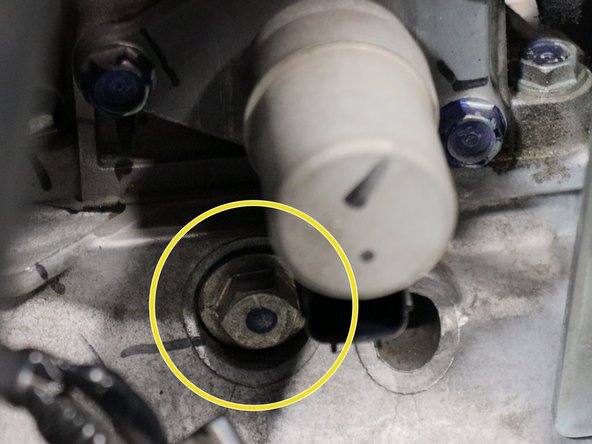 Locate both detent springs.