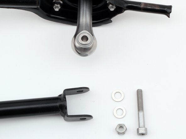 Use the supplied hardware listed in Step 1 and connect the shifter to the linkage. Be sure to use both flat washers and torque the nylon nut.
