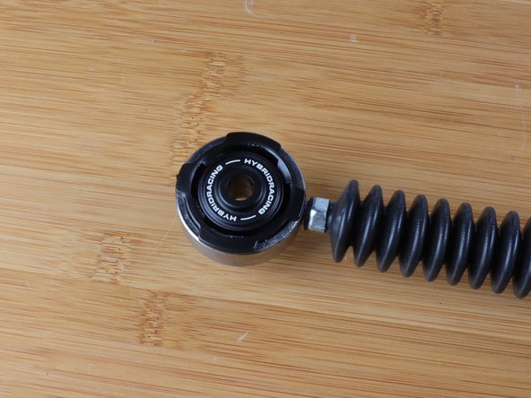 The bushing should move freely and will not come out.