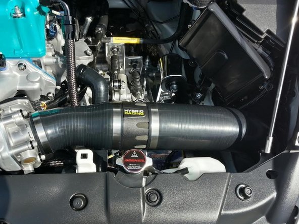 Re-install the body parts and fill the system with coolant.