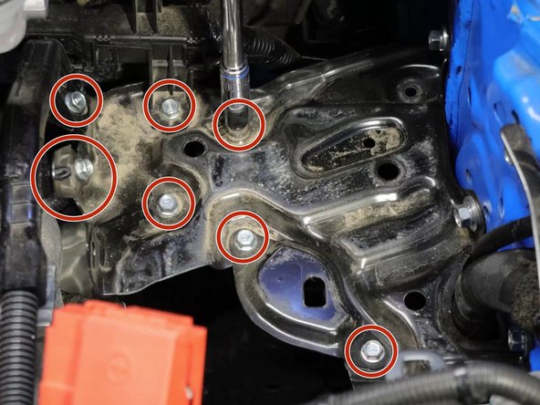 Once the tray is out, you will need to remove a number of bolts and clips. Remove all of the parts that are bolted to the top and sides of the battery tray.