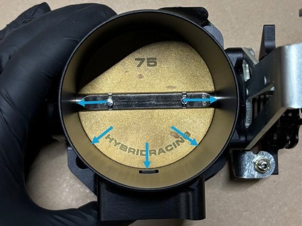 Use alcohol prep pads to clean the throttle plate and inner bore thoroughly (Image 1)