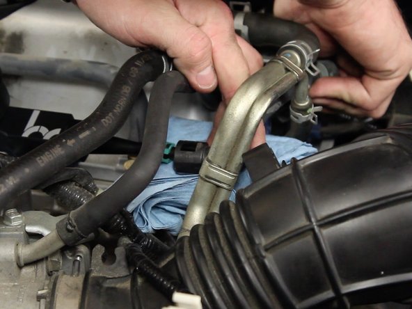 Attach quick disconnect fuel line to the fuel rail.