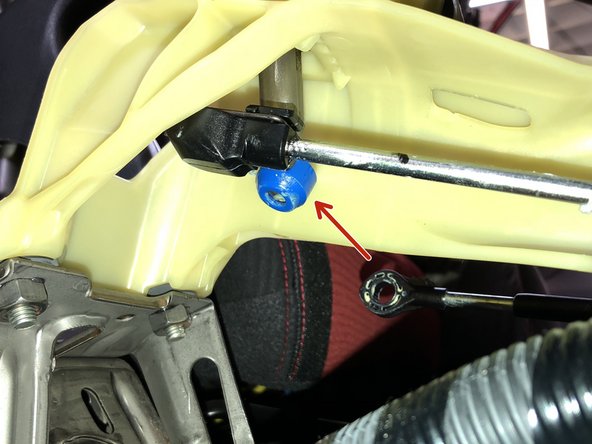 Repeat the process in step 7 and remove the RH side cable from the shifter. Unlock it, spin it, slide it out.