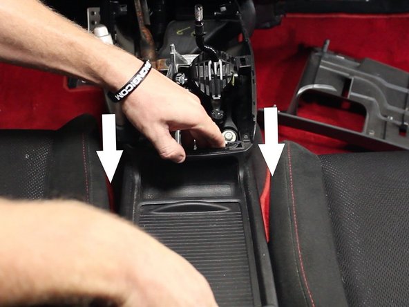 Once all of the screws have been removed, pull the entire console backwards.