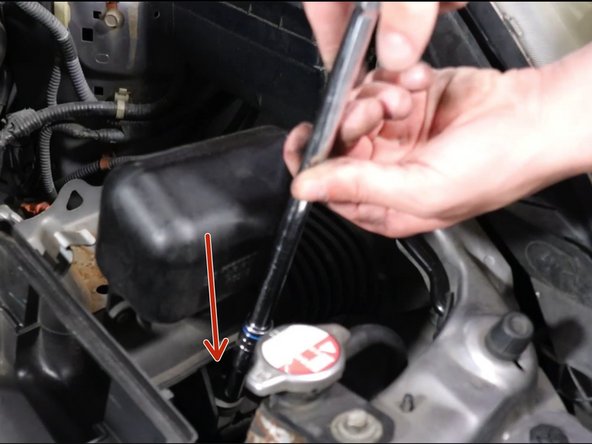 Remove the airbox tube and remove the airbox assembly.