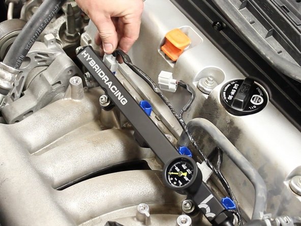 Clip the injector clips onto the new injectors.