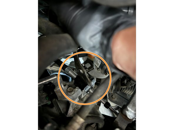 Remove the Shifter Cable Clips. Use a Channel-Lock pliers and/or Flat-Head Driver to remove the clips.