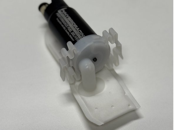 Install the new supplied pump filter and use the provided retaining clip to hold it in place.