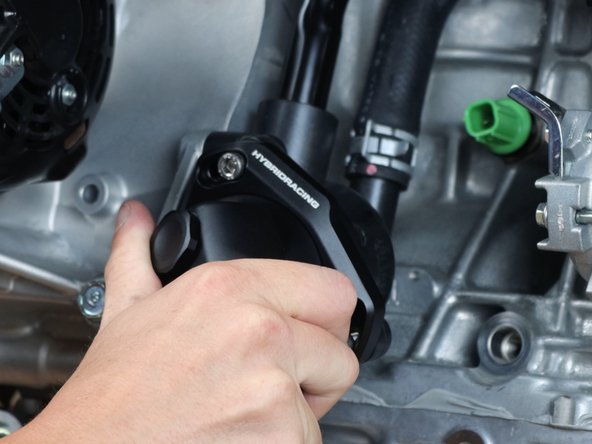 Fill the cooling system and confirm there are no leaks.