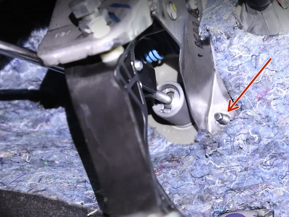 Remove the two 12mm nuts so the CMC can slide outward.