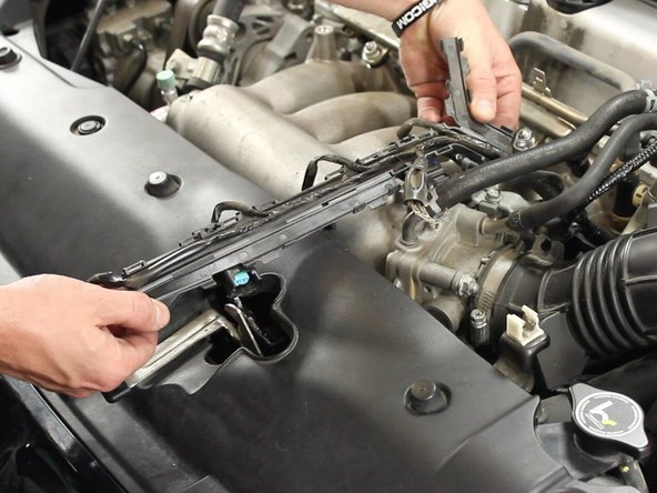 There are many clips that hold the cover together, you may need to use both hands to pry it open as you un-clip it. This item will not be reused.