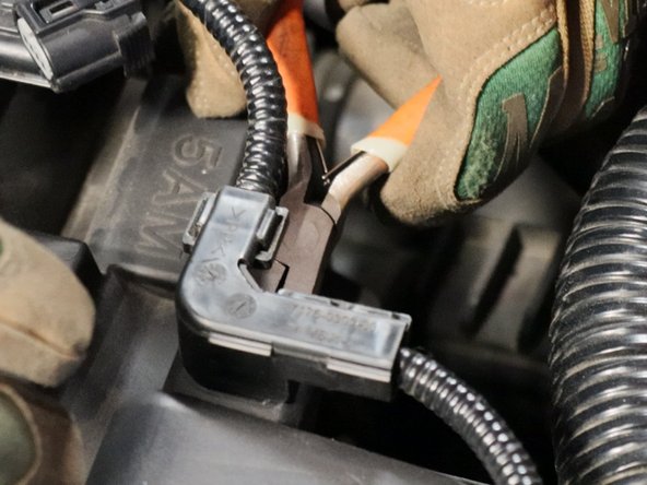 Remove the wire harness from the airbox.