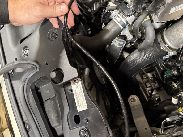 Route it along the front of the car and position it so the intake box can go in without snagging and the connector is easy to reach when you plug in the MAF sensor.