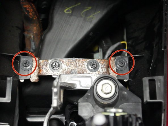 Remove the two mounting screws.