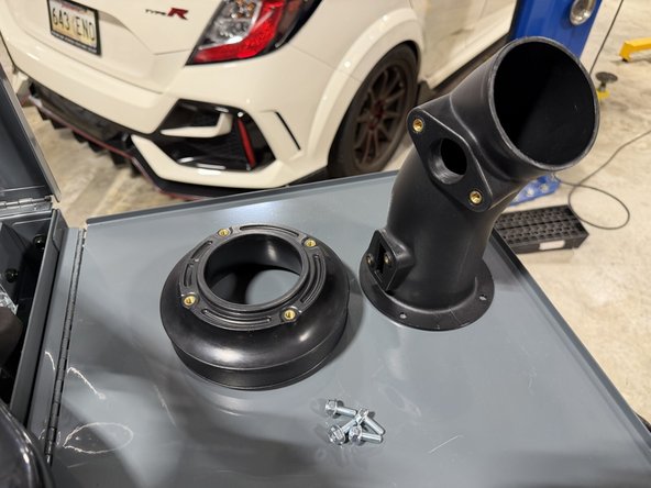Locate your velocity stack and MAF housing inlet. Fit the velocity stack into the opening in the airbox from the inside.