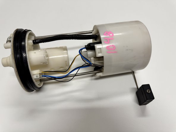 Now you are ready to install the pump back into the chassis. Be careful not to damage the fuel level sending unit during this process.