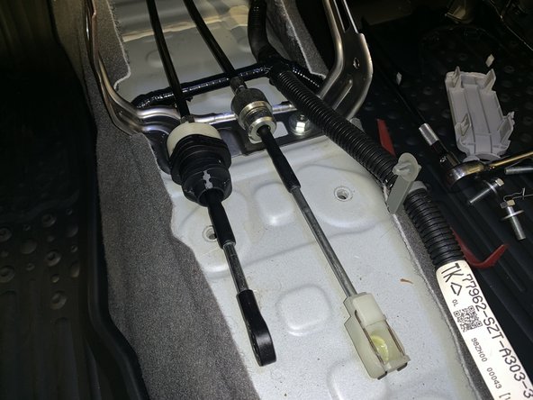 Remove the shifter from the car.