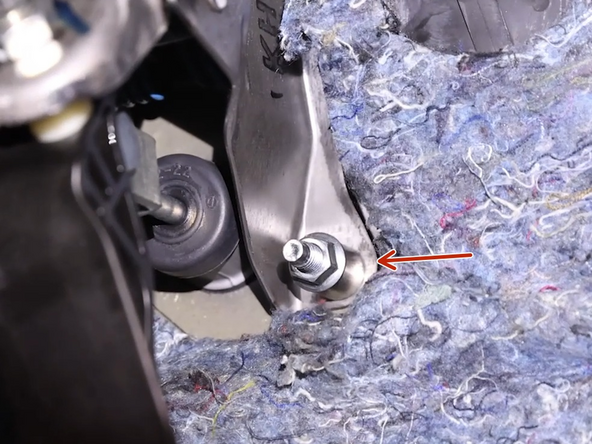 Install the mounting spacers and secure the CMC with the factory 12mm nuts.