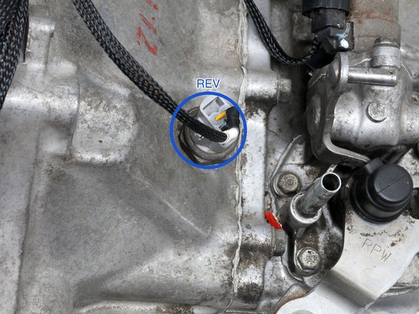 Plug in the reverse lockout solenoid (labeled RVSL, orange ring).