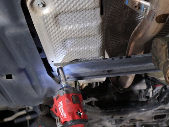 Remove the lower chassis brace.