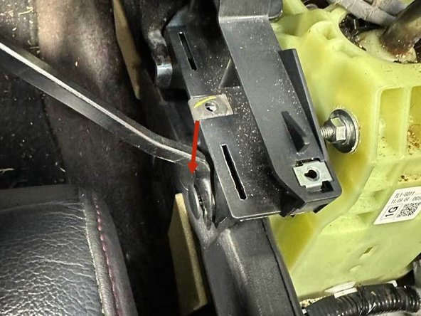 Using a panel popper, remove the clips that hold the AC vent in place.