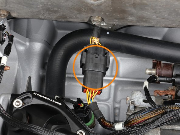 Drop the injector sub-harness down from the top and plug in INJ1 through INJ4, cylinder 1 at the chain side (labeled INJ1, violet ring).