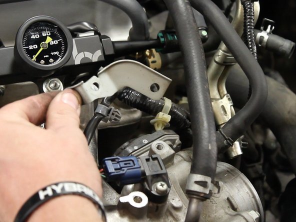 Unclamp the MAP sensor wire harness from the bracket and discard the bracket.