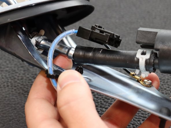 Install the rubber hose on the new Hybrid Racing fuel pump. Be sure to use the included line and clamps if your hose is not in good shape.