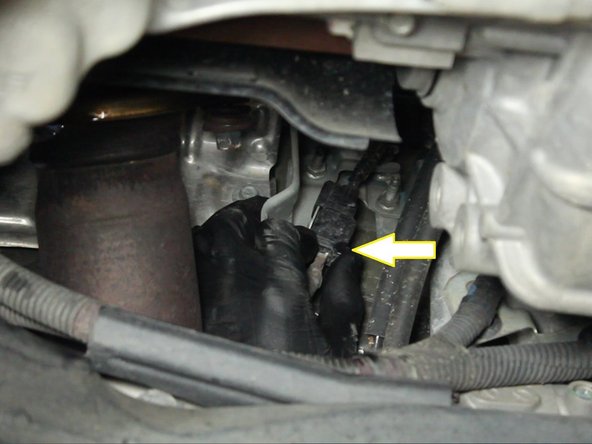 Unplug the primary o2 sensor from the plug that is attached to the firewall by pressing on the release clip.