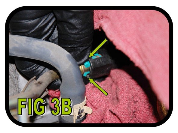 Place a rag around the fuel line, then squeeze the (2) green tabs and pull the fuel line off as shown in FIG 3B. Be careful when doing so as there will likely be pressure in the fuel line.