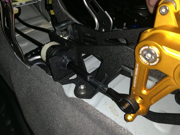 Install the RH side cable and use the OE retaining C clip. You can tap it down into place.