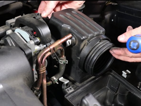 Remove the throttle body clamp.