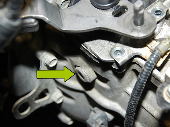 Once you are completely sure the car is in neutral, we will remove the shifter arm assembly from the transmission.