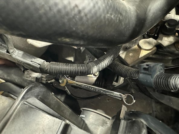 Hold fitting on SLV Cylinder with the 17mm wrench.