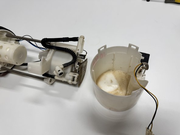 Once all are unclipped, slide the cover off.