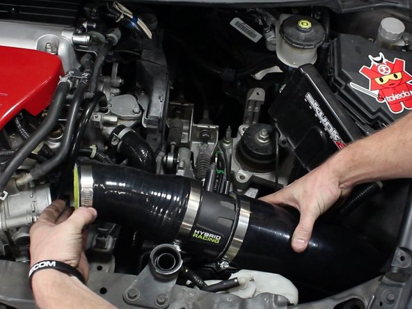 Slide the HR intake into place. Make sure there is enough room near the fender well.