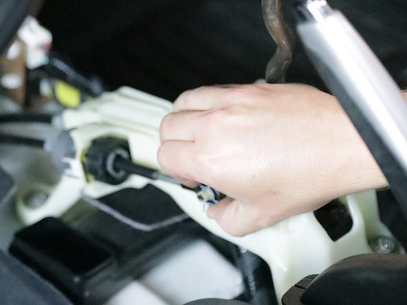 Remove the left side shifter cable by removing the retaining pin.