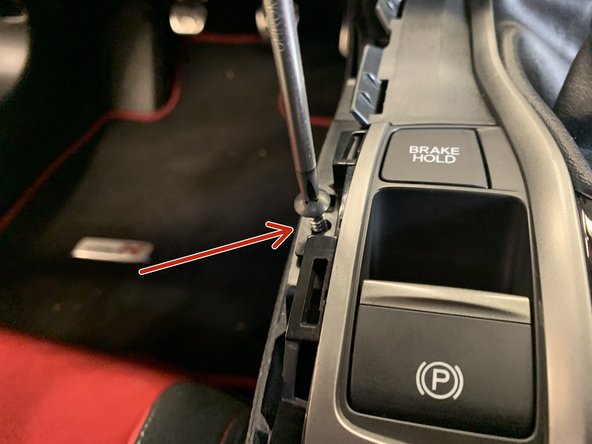 Use your hands and pry the sides of the cover up and pop it off.