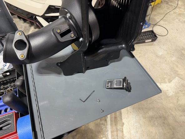 The kit includes new screws and an Allen key for the MAF sensor.