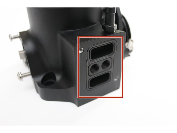 If you ARE using the idle air control valve (IACV) you will NOT be using the supplied 1/8th NPT plugs.