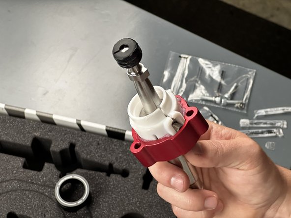 Pay attention to the groove in the Shifter Base. It will align with the bump on the Shifter Pivot Seat. This is critical as the shifter will not align correctly otherwise.