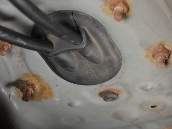 Push the cable seal back into place. Make sure it is fully clipped into place.