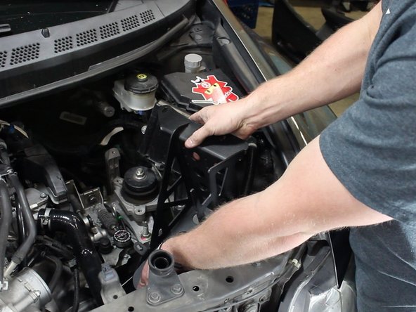 Slide the HR battery tray into place. Be sure to take your time.