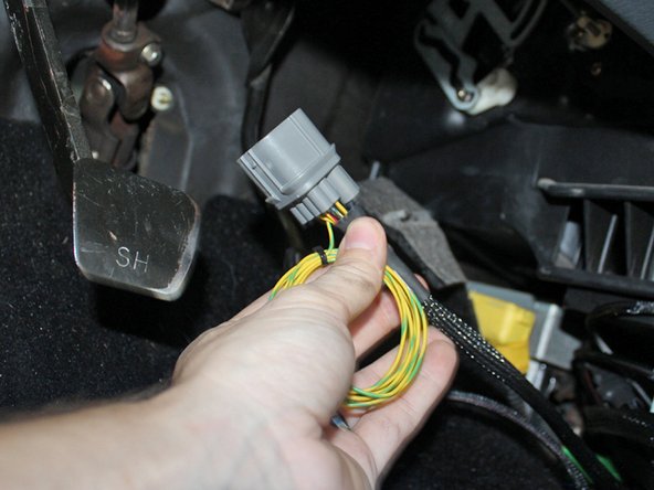 Route the C101.1 Grey connector on the Hybrid Racing harness to the driver side of your chassis. You can use the supplied zip ties to secure it nicely under the dash.