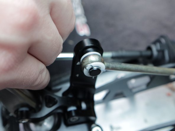 Install the shifter cable end links onto the shifter.