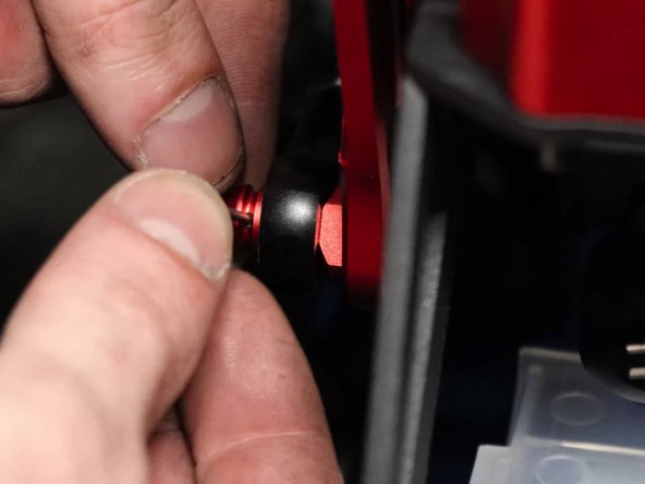 Attach the shifter cable end links to the shifter.